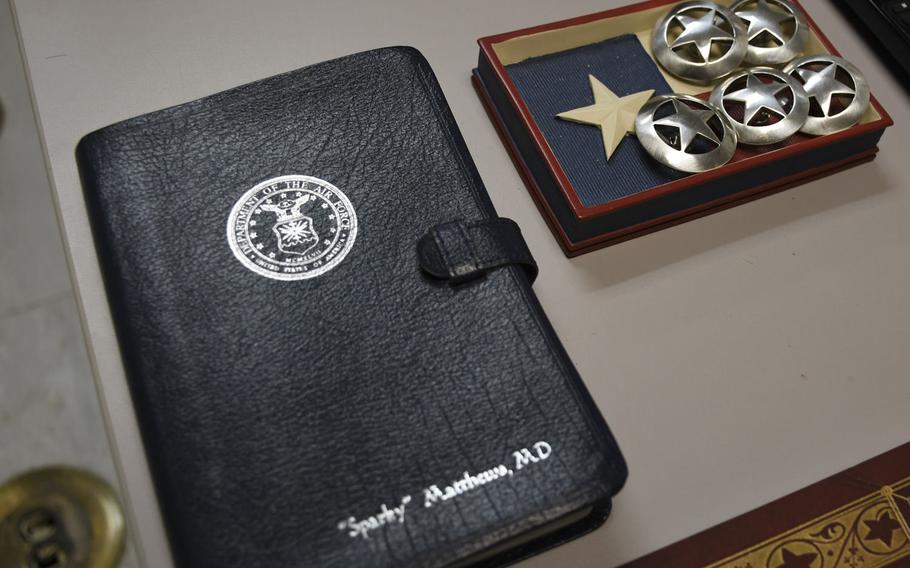 Pictured here on Monday, Jan. 29, 2018, on Col. Walter "Sparky" Matthews' desk, is his notebook and a tray of small Texas Ranger-like badges the head of the Craig Joint Theater Hospital at Bagram Air Field hands out to staff for their good work.