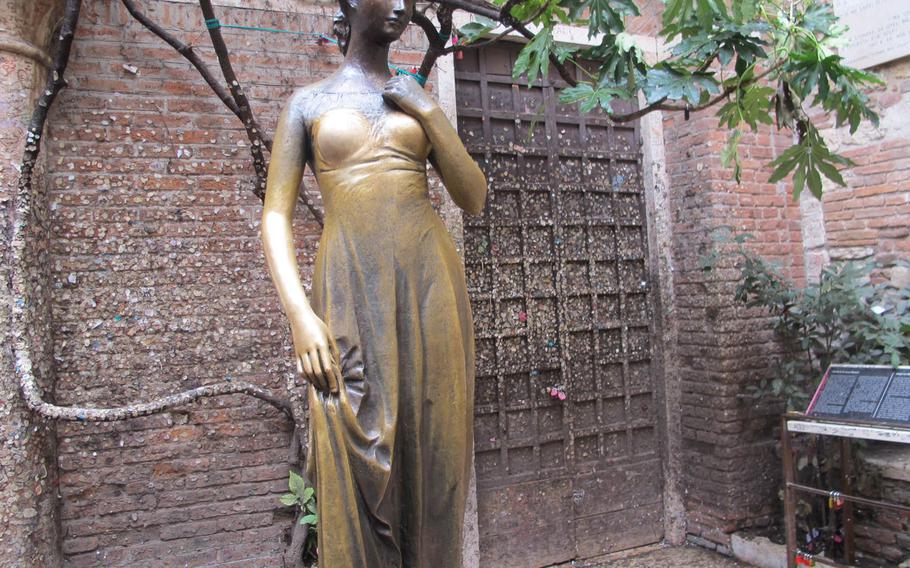 The bronze statue of Shakespeare's Juliet is in the courtyard of the Cappelletti house in Verona, Italy.