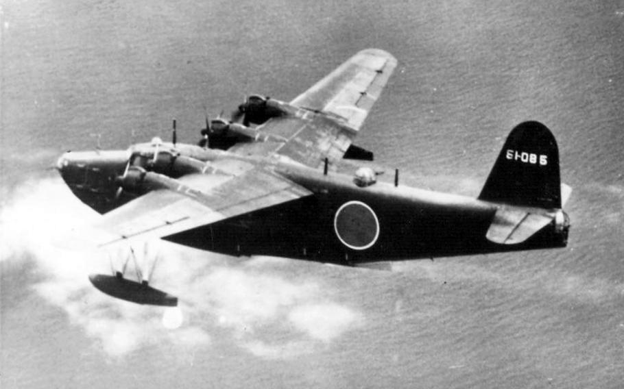 A Japanese Kawanishi H8K is seen seconds before being shot down by a Navy aircraft in July 1944.