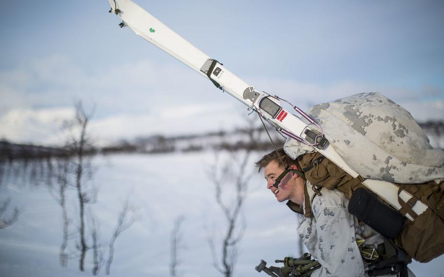 Marine moves into position before conducting a mountainous assault on enemy position during exercise White Claymore near Bardufoss, Norway, February 15, 2018.