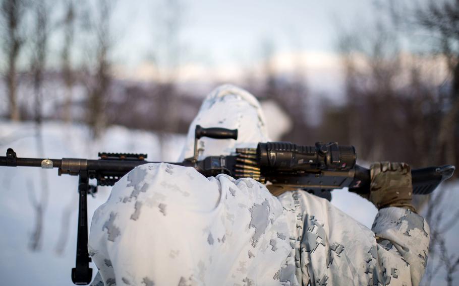 A Marine moves into position before conducting an assault during exercise White Claymore near Bardufoss, Norway, Feb. 15, 2018.