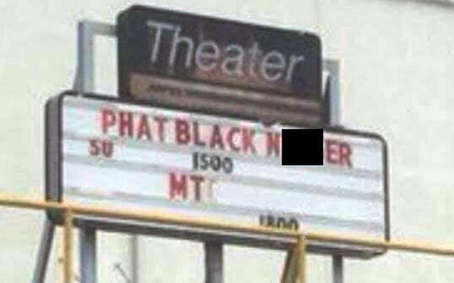 The Marine Corps is investigating after a racial slur was posted on a movie theater marquee over the weekend at Camp Hansen, Okinawa.