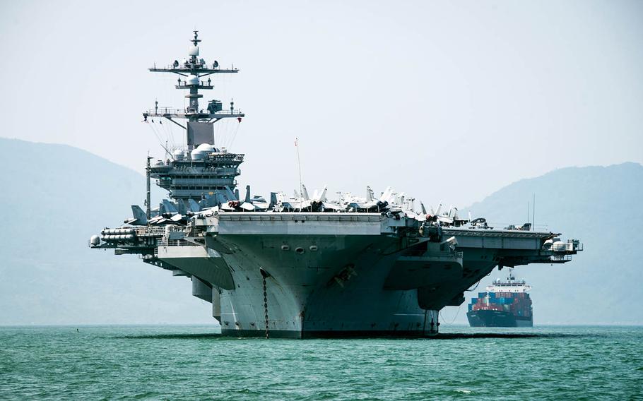 The aircraft carrier USS Carl Vinson arrives in Danang, Vietnam, Monday, March 5, 2018.