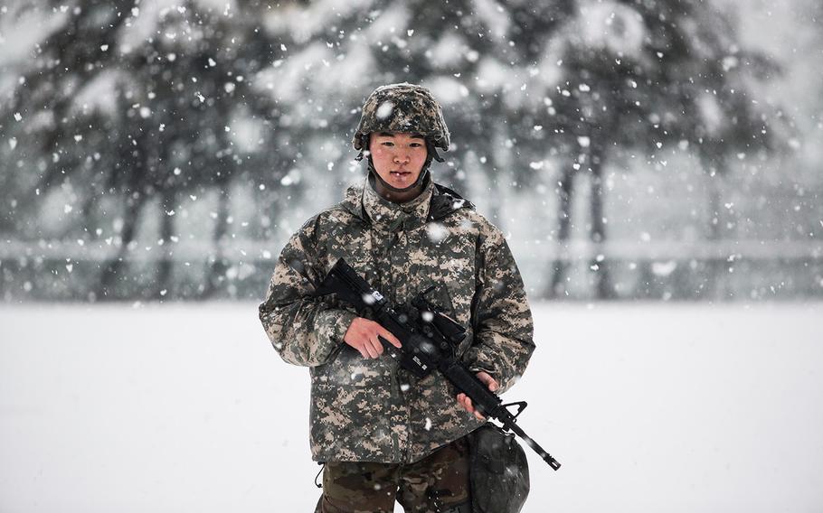 A 19th Expeditionary Sustainment Command best-warrior competitor poses at Camp Walker, South Korea, Thursday, March 8, 2018.