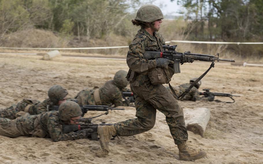 U.S. Marine Corps Rct. Gianna Paul during Basic Warrior Training at Paige Field on Marine Corps Recruit Depot, Parris Island, S.C., on Feb. 7, 2018.  A new study found that unit cohesion was unaffected by adding women.