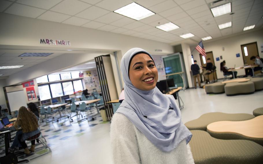 Daegu Middle High School senior Nurfatihah Melendez talks about the open-classroom concept at her school at Camp Walker, South Korea, Friday, March 9, 2018.
