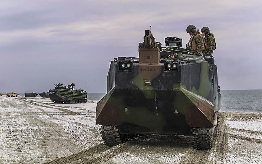 A team from the 26th Marine Expeditionary Unit drives onto a beach in the Capu Midia training area on March 9, 2018, to participate in Spring Storm, a Romanian-led exercise in the Black Sea to enhance amphibious operations and strengthen teamwork between Romanian and U.S. naval forces.