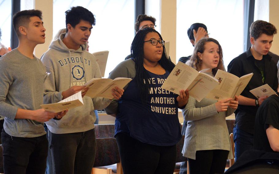 Members of the choir rehearse a song at the DODEA-Europe Honors Music Festival, Tuesday, March 13, 2018. Representing 17 high schools, nearly 150 singers and musicians participated in this years weeklong event.