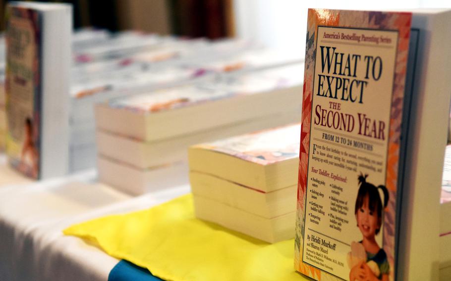 The What to Expect series of books, ready to be signed by author Heidi Murkoff at the Special Delivery baby shower event, at Grafenwoehr, Germany, Wednesday, March 14, 2018.