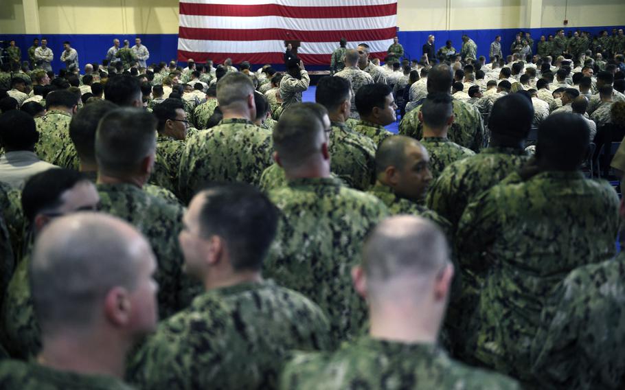 Servicemembers stand by prior to an all hands call with Defense Secretary Jim Mattis at Naval Support Activity Bahrain on March 15, 2018. 