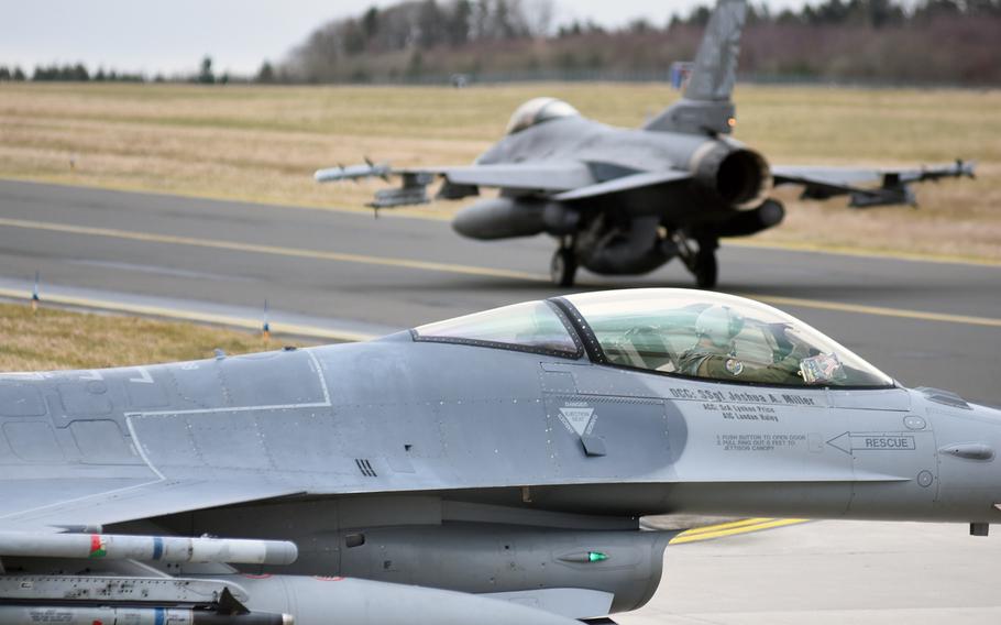 F-16 fighter jets from the 112th Expeditionary Fighter Squadron, deployed to Europe as part of a theater security package from Toledo Air National Guard Base, Ohio, prepare for takeoff on Tuesday, March 13, 2018, at Spangdahlem Air Base, Germany. The jets were participating in a large-scale basewide exercise with Spangdahlem personnel.