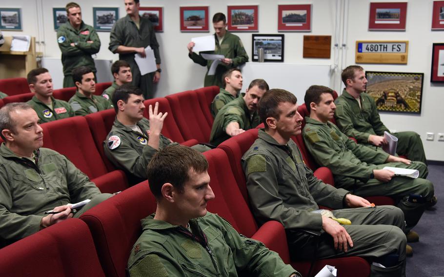 Ohio National Guard F-16 pilots with the 112th Expeditionary Fighter Squadron from Toledo join pilots with the 480th Fighter Squadron at Spangdahlem Air Base, Germany, for a joint pre-flight briefing on Tuesday, March 13, 2018. The squadrons flew numerous sorties while training together during a basewide exercise that coincided with the Ohio pilots' deployment to Europe.