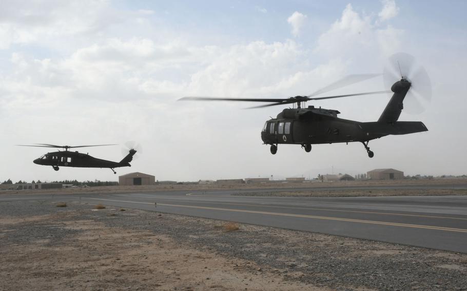Afghan pilots learning to operate the UH-60 Black Hawk fly in the aircraft for the first time with U.S. contractors at Kandahar Air Field on Monday, March 19, 2018.