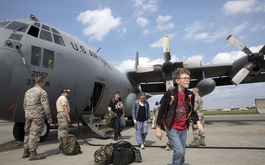U.S. military dependents from throughout the Korean Peninsula arrive at Yokota Air Base, Japan, during a noncombatant evacuation exercise last spring.