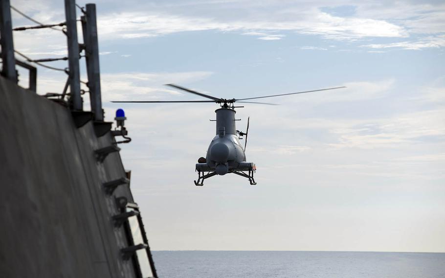 An MQ-8B Fire Scout drone prepares to land on the littoral combat ship USS Coronado last year in the South China Sea.