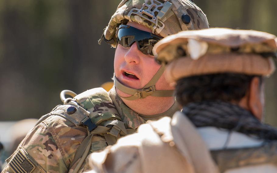 Army Capt. Christopher Young, a combat adviser team leader with the 1st Security Force Assistance Brigade, is pictured during a mission rehearsal exercise Jan. 15 at the Joint Readiness Training Center at Fort Polk, La. His combat adviser team was attacked in the scenario by a role player portraying a disgruntled Afghan police officer, leaving several Afghan civilians and soldiers and an American soldier wounded. 