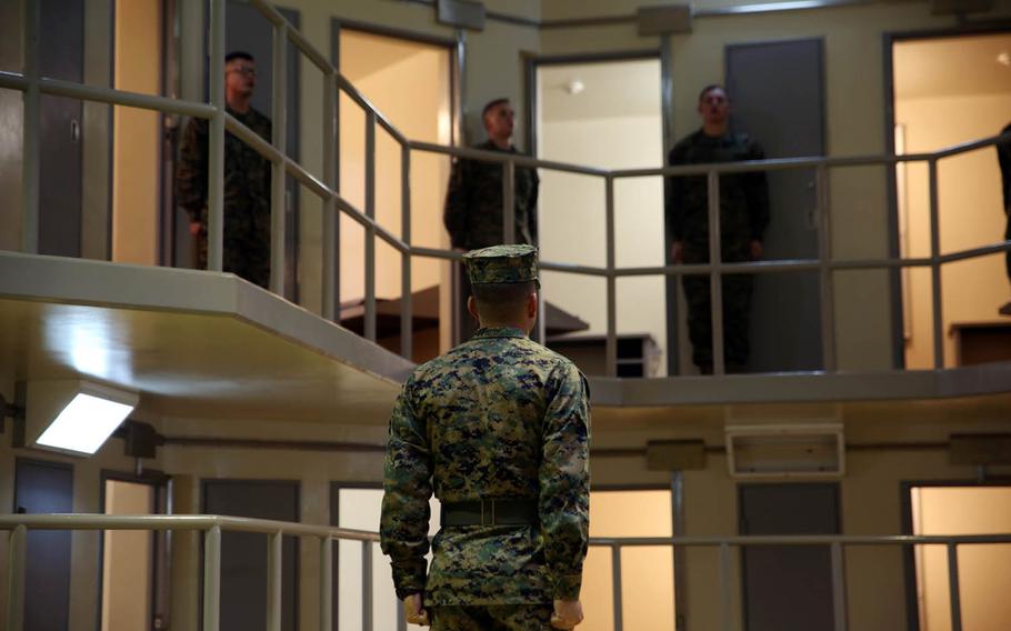 Marines simulate a day in the Correctional Custody Unit at Camp Hansen, Okinawa, Jan. 12, 2018.