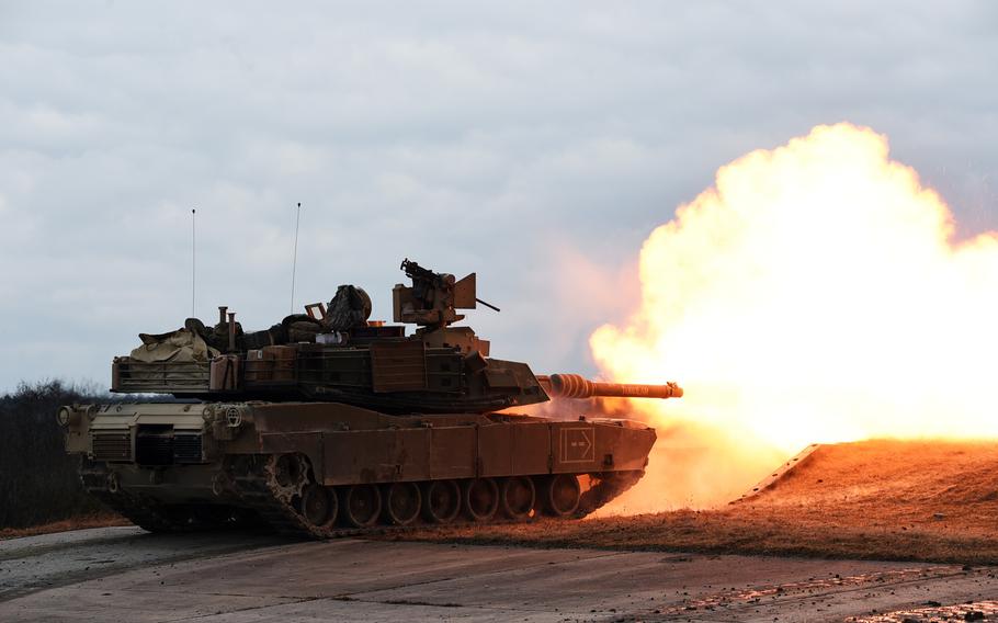 An M1A2 Abrams tank fires during a live-fire exercise at Grafenwoehr, Germany, Wednesday, March 28, 2018. 