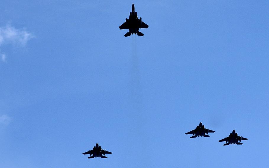 F-15s executing the Missing Man Formation. Thirty F-15C Eagles from the Air National Guard's 173rd Fighter Wing, at Kingsley Field, Ore., are scheduled to resume flight operations Thursday since being grounded over pilot safety concerns last week.