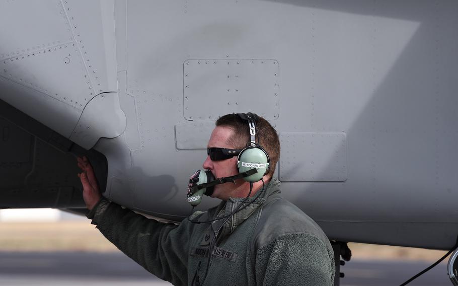 U.S. Air Force Tech. Sgt. Wayne Kochan, 173rd Fighter Wing crew chief, prepares an F-15 for takeoff, Dec. 1, 2017, at Kingsley Field, Ore. Thirty F-15C Eagles from the Air National Guard's 173rd Fighter Wing are scheduled to resume flight operations Thursday after being grounded over pilot safety concerns last week.