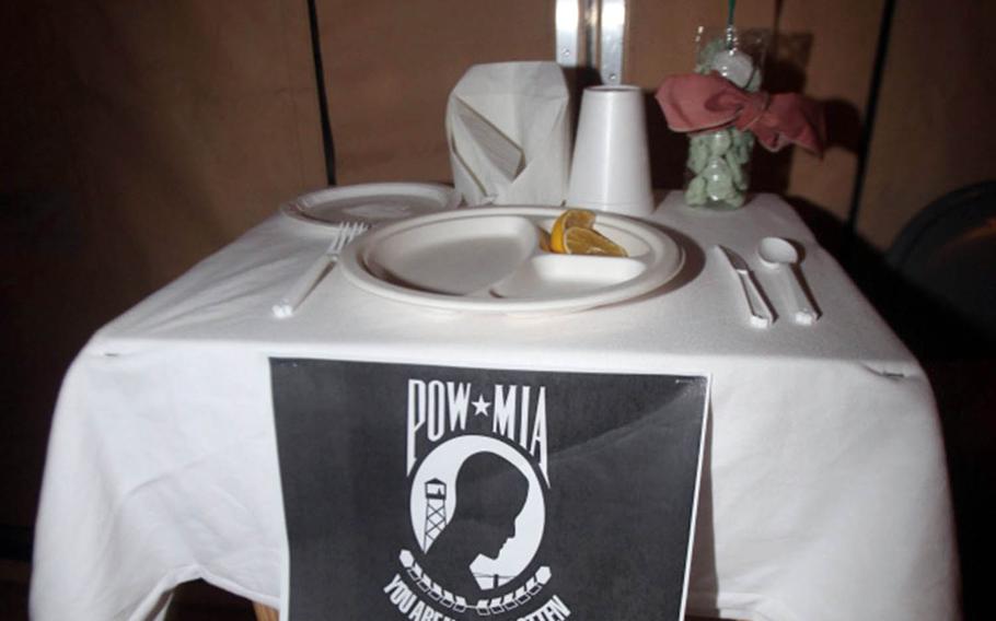 A POW/MIA "Missing Man" table display set for POW/MIA Recognition Day 2010 at Camp Delaram II's dining facility in Afghanistan.