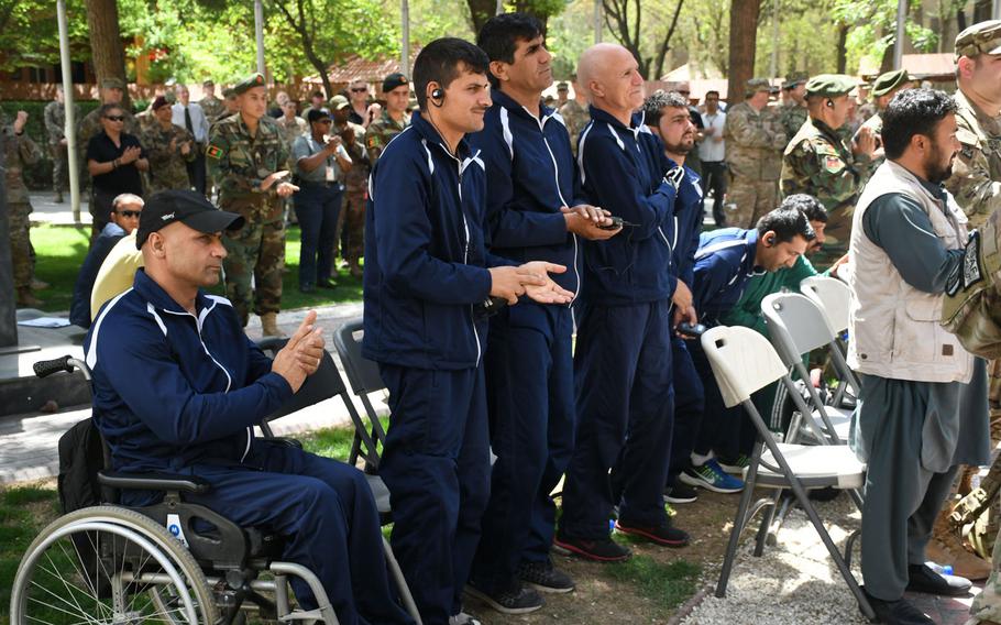 Wounded Afghan troops attend an operation Proper Exit ceremony at NATO's Resolute Headquarters in Kabul on Saturday, April 7, 2018. 

