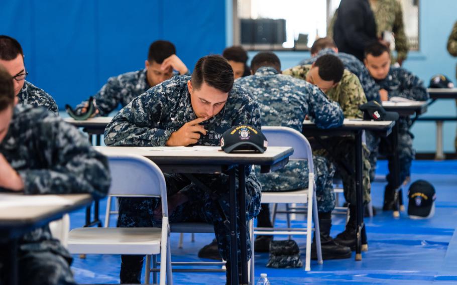 Petty Officer 3rd Class Zackary Tapia, assigned to the amphibious assault ship USS Makin Island, takes the Navy-wide E-5 advancement exam at Naval Station San Diego, March 8, 2018.