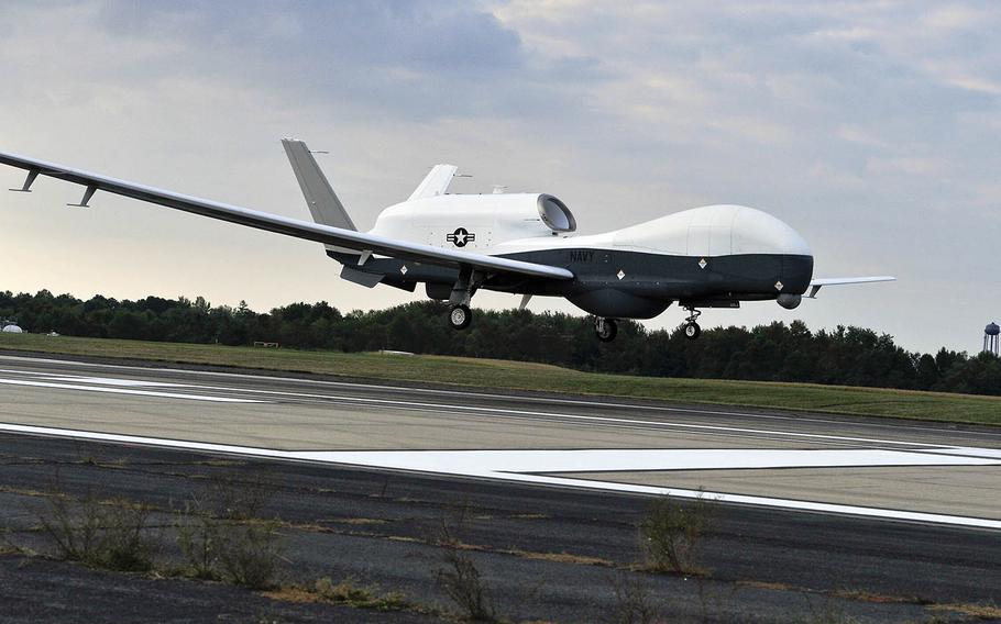 A Navy MQ-4C Triton lands at Naval Air Station Patuxent River, Md., Sept. 18, 2014.