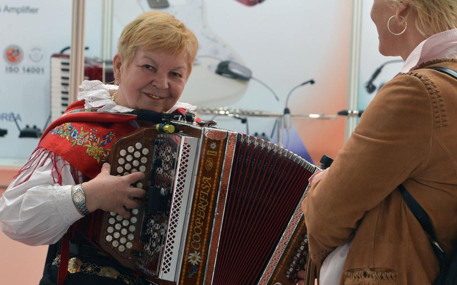 Music instruments from the traditional to the modern are on display at Musikmesse, the music trade fair in Frankfurt, Germany. Here, a musician plays the accordion for visitors