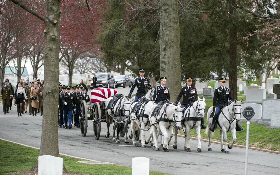 The 3rd U.S. Infantry Regiment Caisson Platoon, known as "The Old Guard," escorts a former Army colonel to his final resting place at Arlington National Cemetery, April 2, 2018.