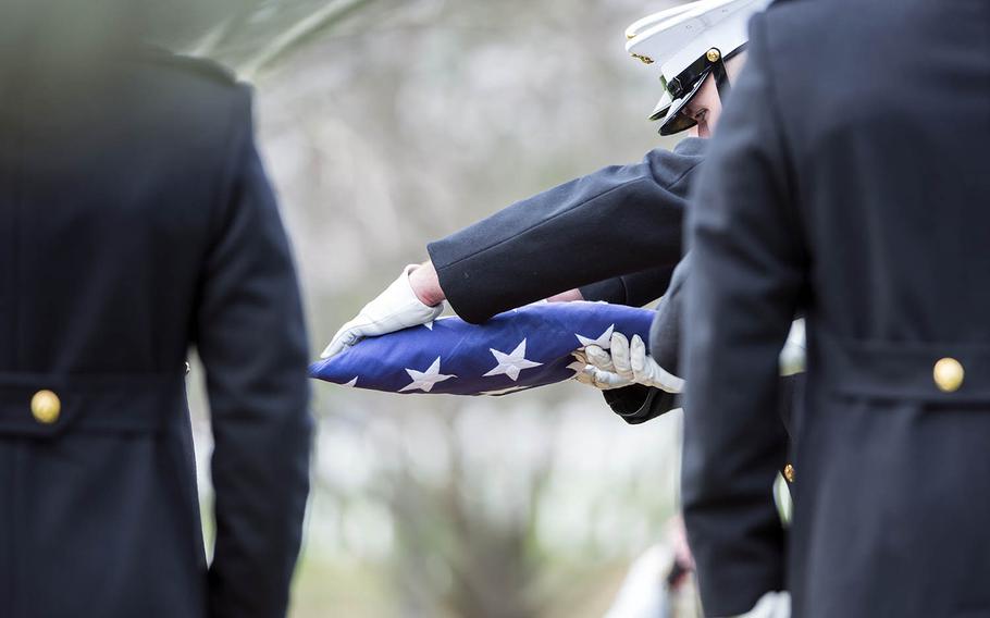 A full-honors funeral takes place at Arlington National Cemetery, Monday, April 9, 2018.