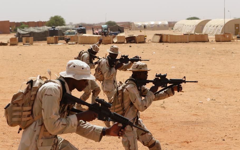 A squad of Senegalese soldiers assaults the objective in a small unit tactics class during Flintlock 2018 in Tahoua, Niger, April 12, 2018.