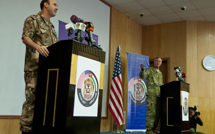 Jordan Armed Forces Brig. Staff Gen. Mohommad Al-Thalji and U.S. Air Force Maj. Gen. Jon Mott, co-directors of Exercise Eager Lion 2018, announce the beginning of the exercise at an April 15 international press conference at the Jordan Special Operations Command near Amman, Jordan.