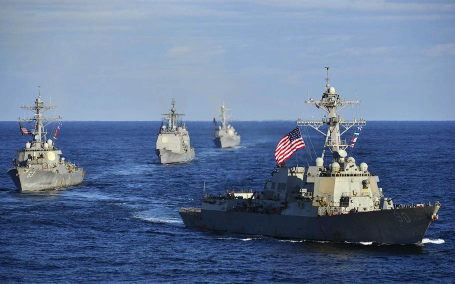 The guided-missile destroyer USS Chafee, right, leads the USS Stethem, the USS Princeton and the USS Sampson while transiting the Western Pacific last November.