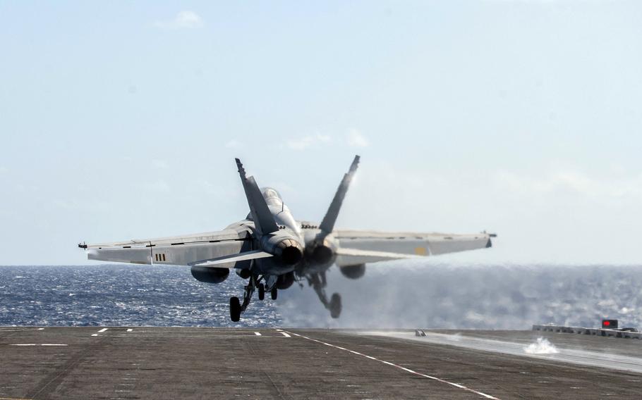 An F/A-18F Super Hornet assigned to the ''Red Rippers'' of Strike Fighter Squadron 11 launches from the aircraft carrier USS Harry S. Truman in the Atlantic Ocean, Saturday, April 14, 2018. The Truman and its carrier strike group have since entered the European theater of operations.