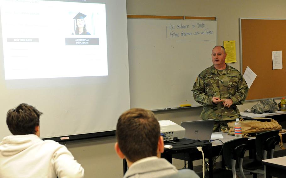 Soldiers talk with students at Arlington High School, Washington, in 2015. The Army recently issued a policy stressing the need to protect personally identifiable information when recruiting.