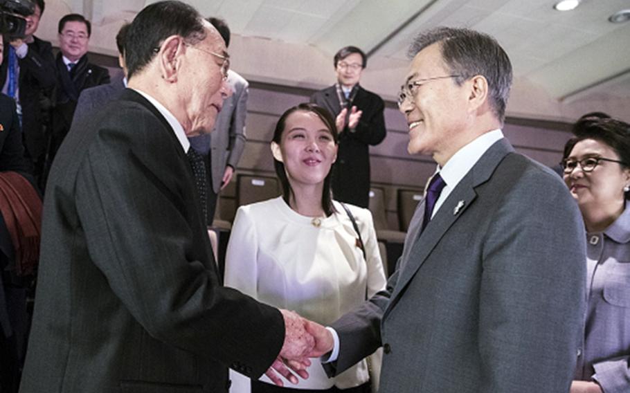 South Korean President Moon Jae-in, right, greets North Korean officials Kim Yong Nam and Kim Yo Jong, sister of leader Kim Jong Un, during a February concert in Seoul, South Korea.