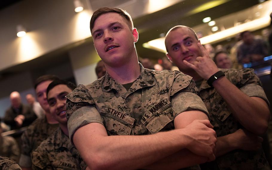Marines watch a USO show at Osan Air Base, South Korea, Monday, April 23, 2018.