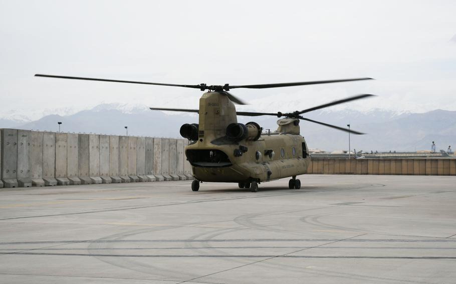 A CH-47 Chinook turns off its engine at Bagram Air Field on March 23, 2018. The Army helicopter is used by the Air Force's 83rd Expeditionary Rescue Squadron, the first joint-personnel rescue squadron comprised of Army aircraft and aircrew and Air Force pararescue specialists.