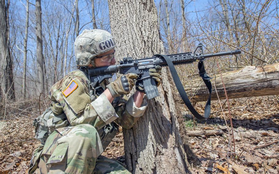 U.S. Military Academy Cadet Taylor England fires her M4 carbine rifle at a target during the Sandhurst Military Skills Competition at West Point, N.Y., April 14, 2018. England, the top-ranked cadet who is branching infantry, plans to serve with the 173rd Airborne Brigade when she completes the Infantry Basic Officer Leader course.