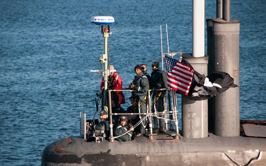 The fast-attack submarine USS Jimmy Carter flies the Jolly Roger in September.