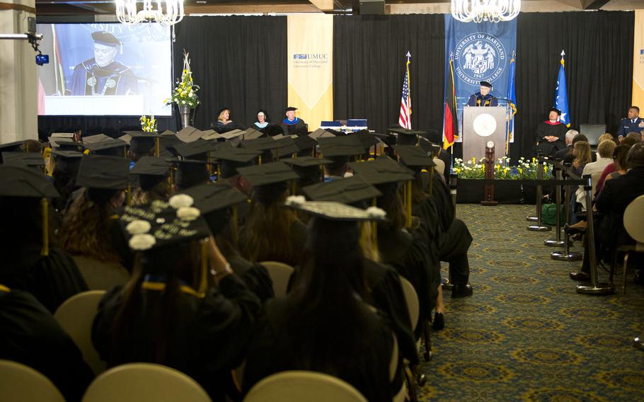 Javier Miyares, University of Maryland University College president, speaks to graduating students during the commencement ceremony at Ramstein Air Base, Germany, on Saturday, April 28, 2018.