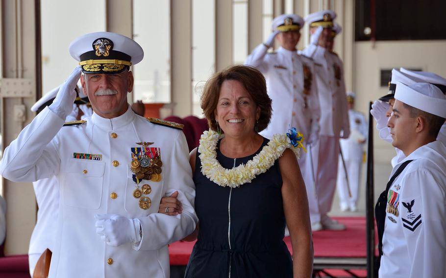 Adm. Scott Swift and his wife, Trish, depart a ceremony at Joint Base Pearl Harbor-Hickam, Hawaii, wherehe turned over command of U.S. Pacific Fleet to Adm. John Aquilino, May 17, 2018.