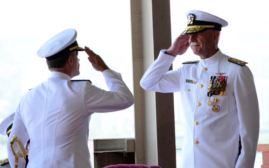 Adm. Scott Swift, right, turns over command of U.S. Pacific Fleet to Adm. John Aquilino during a ceremony at Joint Base Pearl Harbor-Hickam, Hawaii, May 17, 2018.