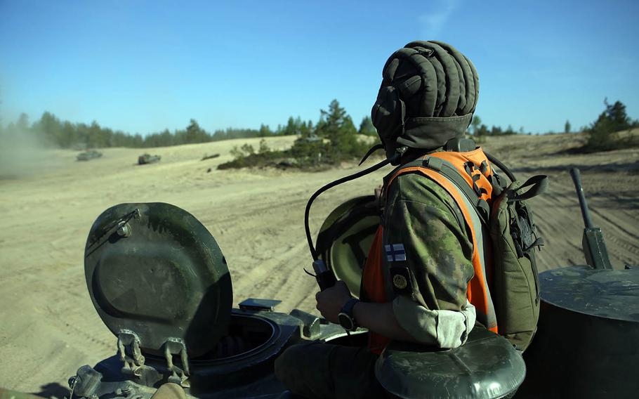 A Finnish soldier overlooks training in Pohjankangas Training Area, Finland, as part of Exercise Arrow 18 on April 15, 2018. Finnish soldiers and U.S. Marines ran drills to find and engage targets with tanks.