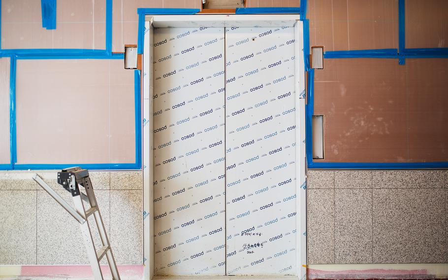 An elevator door awaits final touches at a hospital under construction at Camp Humphreys, South Korea, Wednesday, April 18, 2018.