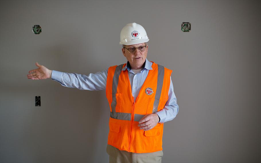 Construction manager David Fortune talks about the new facilities at the hospital being built at Camp Humphreys, South Korea, Wednesday, April 18, 2018.