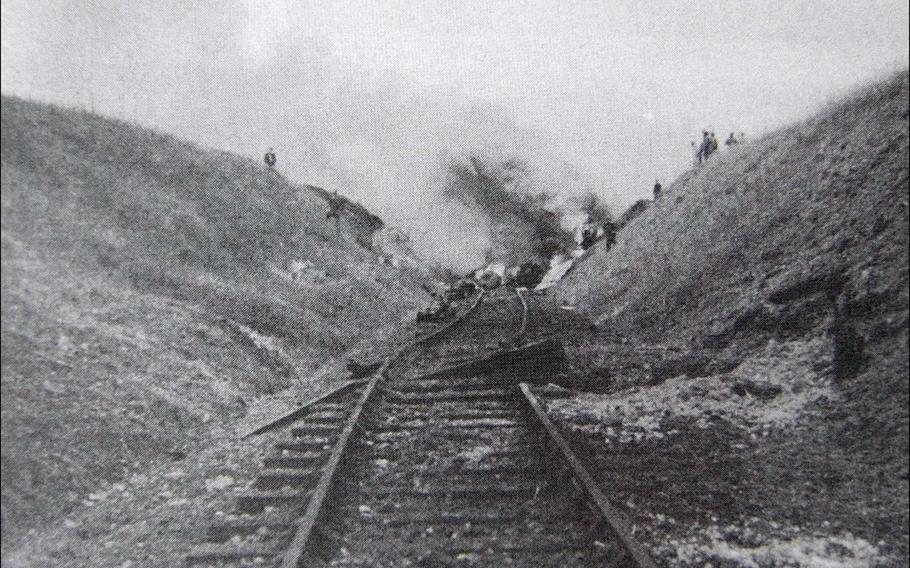 Photo from the crash of a B-17 Flying fortress named Smashing Thru in Ridgefield, England, July 13,1944. Eight crewmembers were killed as the plane skidded into an unseen railroad cut during an emergency landing.
Photo Courtesy of Andy Cox