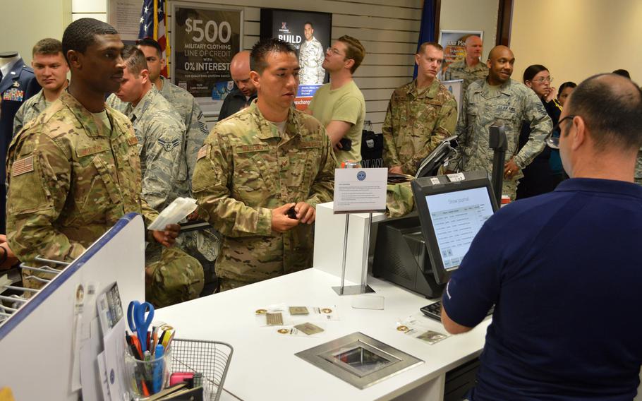 Airmen at Aviano Air Base's military clothing shop purchase items to go with their new Operational Camouflage Pattern uniforms, Monday, Oct. 1, 2018.