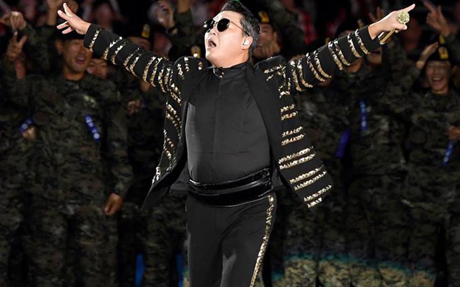 Psy dances with South Korean troops during the 70th Armed Forces Day in Seoul, South Korea, Monday, Oct. 1, 2018.